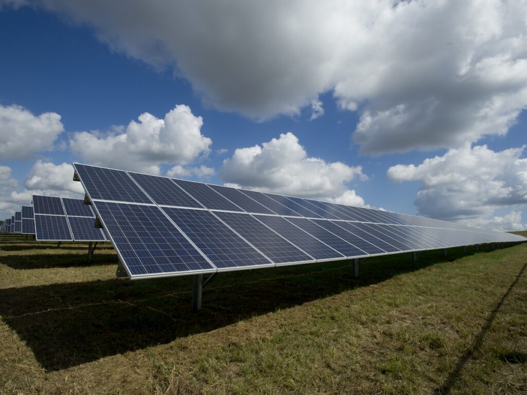 Solar panels on a rooftop with blue sky